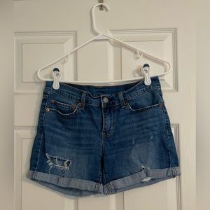 Distressed Levi's Jean Shorts. Size 28.